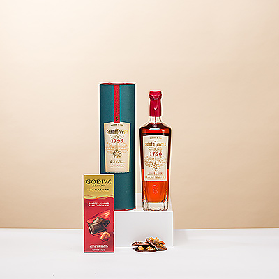 Enjoy premium Santa Teresa rum with delicious Corné Port-Royal Mendiants and a Godiva dark chocolate tablet with roasted almonds in this special gift.