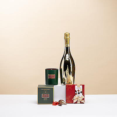 Celebrate Christmas with this exclusive gift trio featuring Bottega Gold Prosecco Spumante, six Neuhaus Christmas chocolates, and a luxury special edition Atelier Rebul Apple and Cinnamon scented candle.