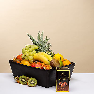 Verwöhnen Sie jemanden mit der perfekten Mischung aus gesundem Obst und einem Hauch von süßem Genuss: köstliche Schokoladentrüffel von Godiva!