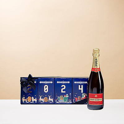 Deséeles un feliz y delicioso Año Nuevo con el festivo champán Piper-Heidsieck y una caja de regalo de edición limitada Jules Destrooper 2024.
