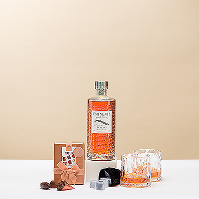 Treat your favorite rum enthusiast to Eminente Reserva 7 Year Cuban Rum with a pair of glasses and luxury Neuhaus Belgian chocolates.