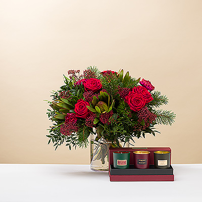 Make it a very Merry Christmas with a beautiful medium sized red and green bouquet presented with a trio of luxurious Atelier Rebul candles.