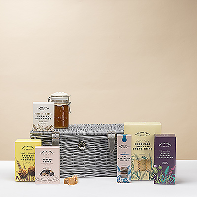 The Ripon Hamper is a traditional wicker basket hamper with a selection of Cartwright & Butler's finest marmalade, delicious sweet treats, and savoury snacks.