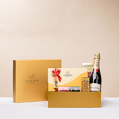 Stoßen Sie auf eine Romanze oder einen besonderen Jahrestag an mit der perfekten Kombination aus Godiva-Pralinen und einer 37,5-cl-Flasche Moët & Chandon Champagner, schön präsentiert in einer Godiva-Geschenkbox.