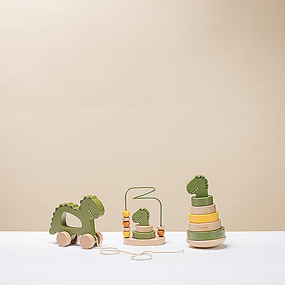 Let playtime begin! This trio of classic wooden toys gets a fun update with a cute dino design. The stacking rings, pull-along toy, and bead maze guarantee hours of fun for little ones, while also developing fine motor skills.