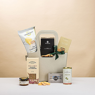 What could be better than sharing a gourmet picnic on a sunny afternoon? This unique gourmet gift features a delicious collection of European savory snacks and appetizers hand packed in a reusable take-anywhere Koziol tote.