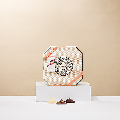 The new Neuhaus Icon Collection gift box features 22 iconic Irresistibles chocolate pralines hand-filled with smooth fresh cream or ganache. This special edition includes two limited-edition Irresistibles, the Frisson and the Folie, to delight your favorite Belgian chocolate connoisseur.