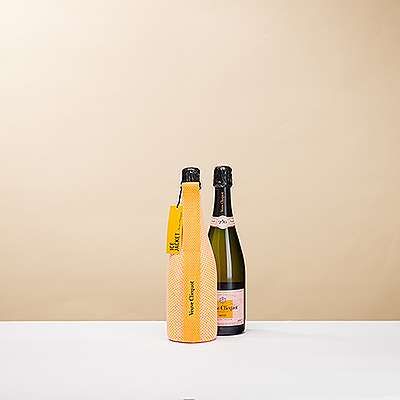 Presenting a must-have limited-edition Veuve Clicquot gift: beautiful Veuve Clicquot Rosé Champagne in an insulating ice jacket. The stylish ice jacket keeps your Veuve at the perfect chilled temperature to preserve all of the characteristics of your favorite bubbly.