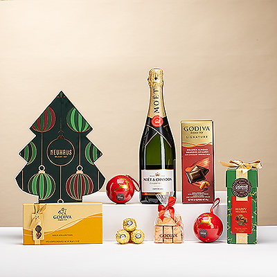 Célébrez les fêtes avec Christmas Chocoholic Deluxe accompagné de Champagne Moët & Chandon. Comprend des chocolats Neuhaus, Godiva, Corné Port-Royal et Ferrero Rocher.