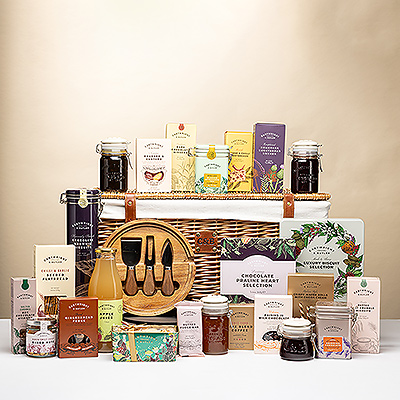 Celebrate the season with the Cartwright &#38; Butler Alcohol-Free Christmas Hamper. A gourmet selection of sweet and savoury treats, biscuits, chocolates, teas &#38; juices in a wicker basket.