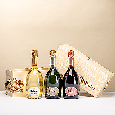 Die R&#53; de Ruinart, Blanc de Blancs & Rosé in Holzkiste vereint drei ikonische Ruinart-Cuvées in einem eleganten Holzset — ein luxuriöses Geschenk für Champagnerliebhaber.