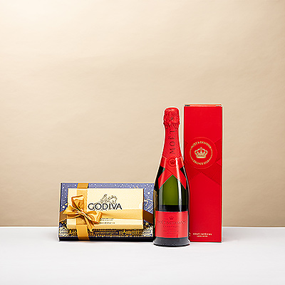 A luxurious holiday gift featuring the iconic Moët & Chandon Brut Impérial limited-edition giftbox paired with the elegant Godiva Holiday Jingle Tower . A perfect combination of Champagne and Belgian chocolate indulgence.