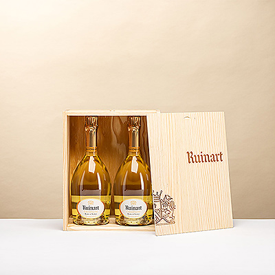 Enjoy the exclusive Ruinart Duo Blanc de Blancs in a luxury wooden gift box. This refined Champagne with fresh citrus and floral notes is the perfect gift for every enthusiast.