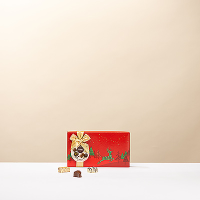Discover this festive Corné Port-Royal gift box filled with refined Belgian pralines . A delightful Christmas gift for warm holiday moments and sweet indulgence.