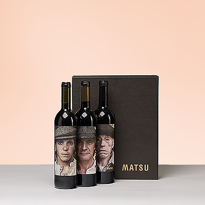 This Spanish wine gift trio by Matsu is sure to make an impression: once when the unique bottle designs are first seen, and again when the seductive red wine is enjoyed.