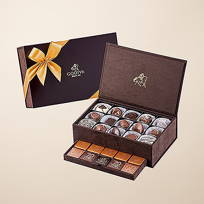 To give a truly wonderful chocolate gift, Godiva offers its beautiful keepsake gift box. Godiva/s Royal Boxes are brimming with Godiva/s amazing array of delicious chocolates and tantalizing carrés.