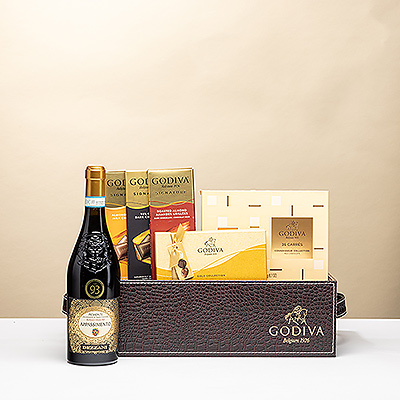 Exclusivo lote Godiva con chocolates belgas & vino tinto Dezzani Appassimento. Regalo ideal para empresas, familia y celebraciones.
